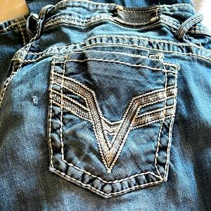 Vigoss jeans. Bought with slits in them.